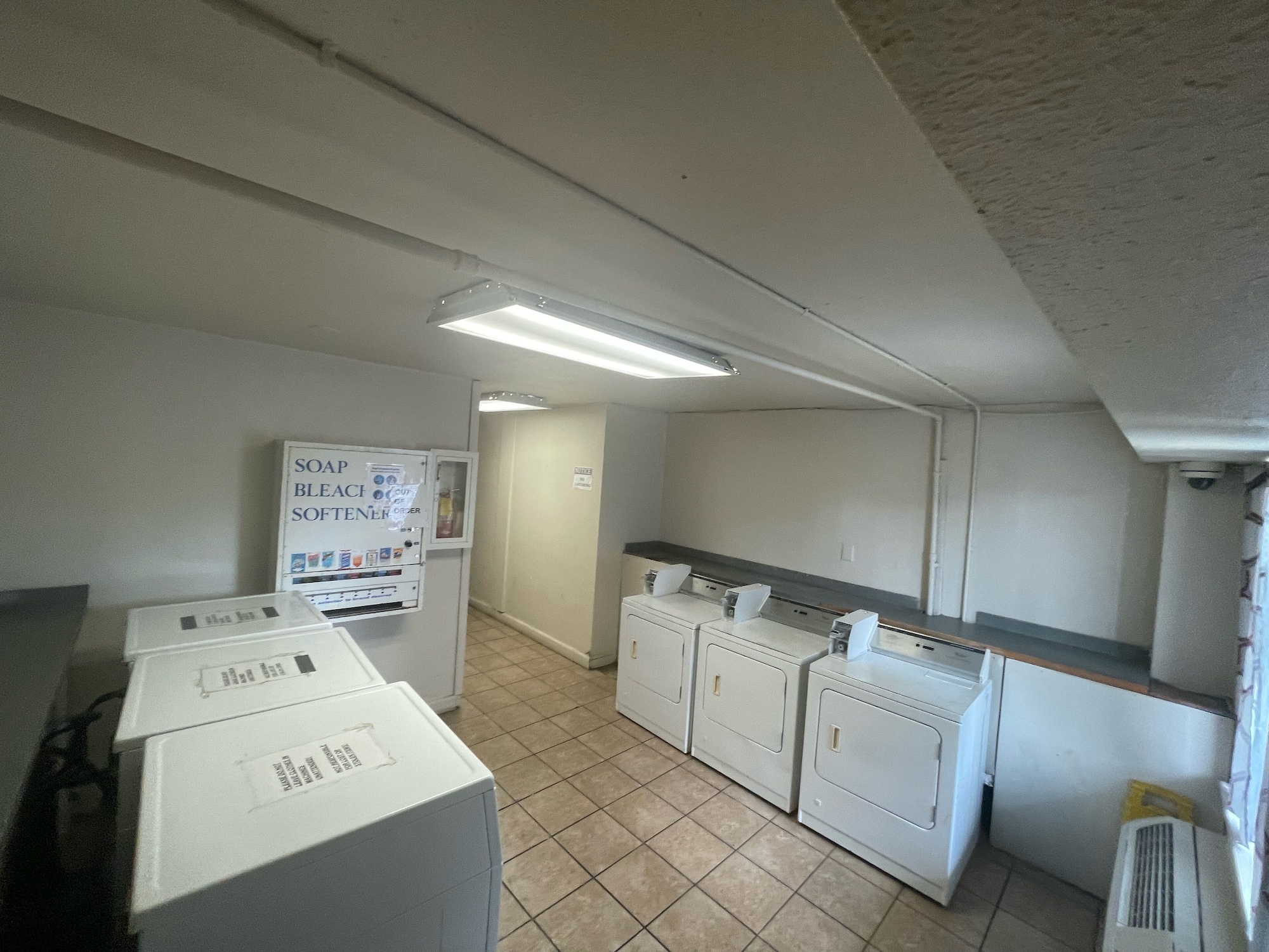 Laundry room at Budgetel Inn and Suites in Louisville