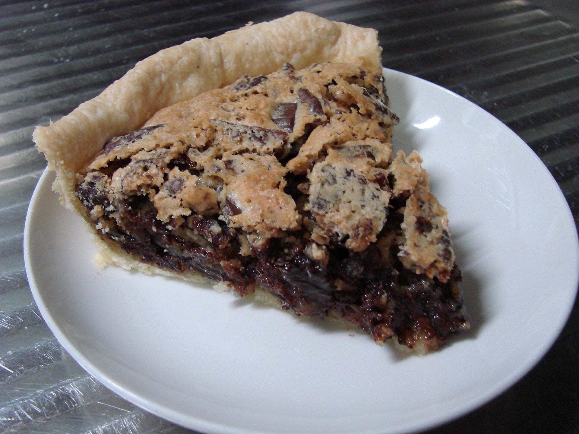 A slice of chocolate walnut pie