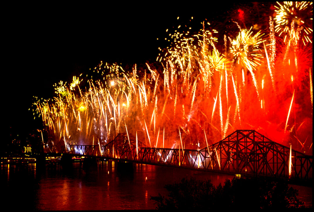 Fireworks launched from the Clark Memorial Bridge during Thunder Over Louisville